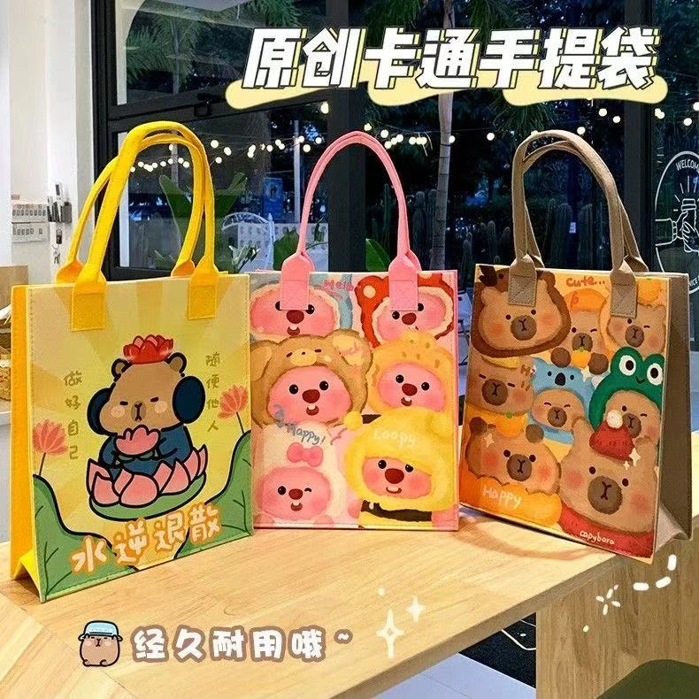 2025新款毛毡手提袋手拎包学生印花卡通礼品袋卡皮巴拉可爱手提包
