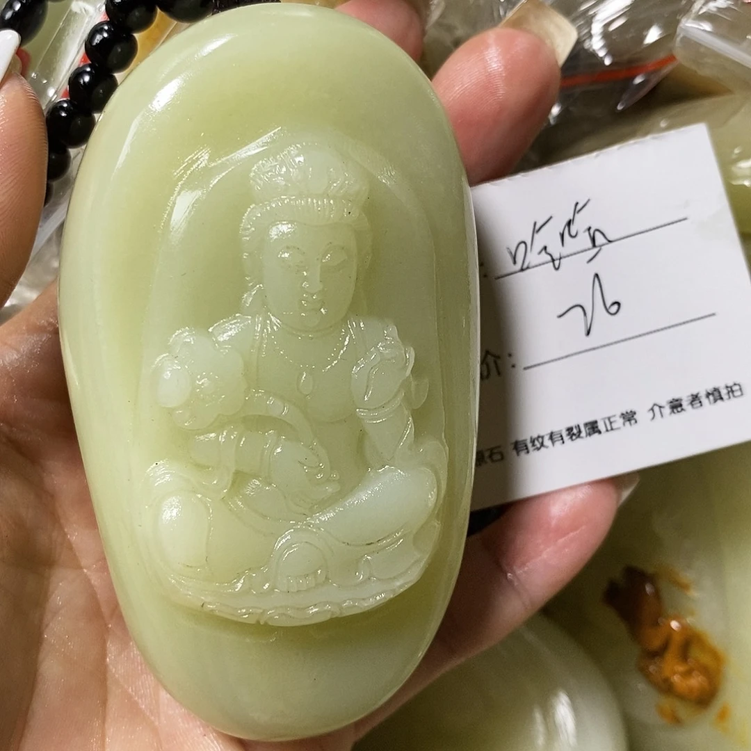 石材哈*古青石手把件