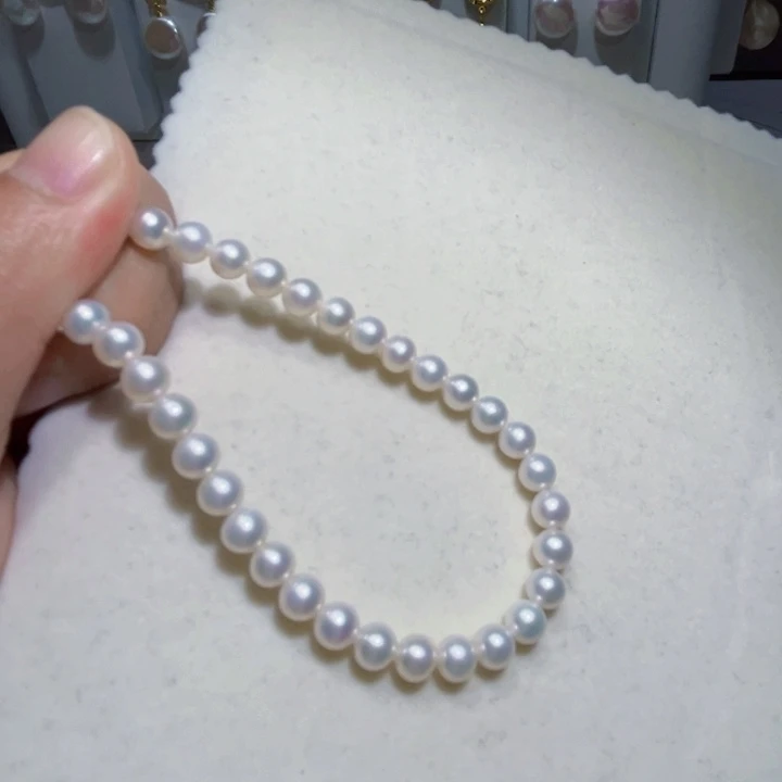 淡水珍珠手链18K金镶嵌印****鹊