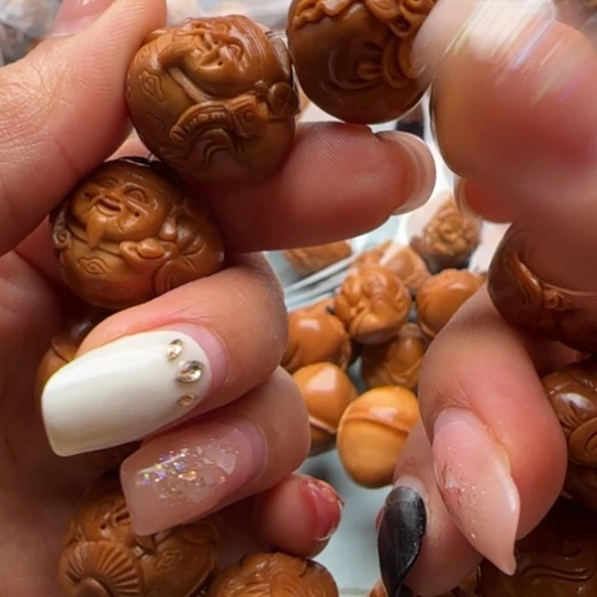 小***骨橄榄核吊坠橄榄雕工艺品