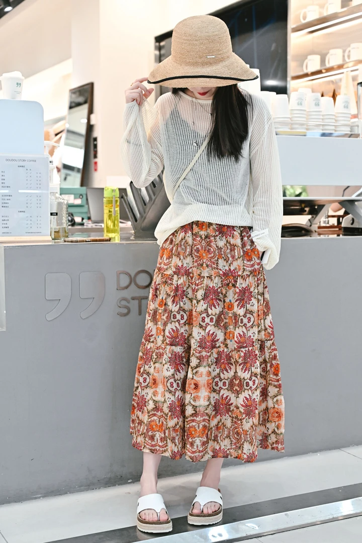 HALUNGLE/海伦格丽  50996  夏款时尚复古游牧花精致苎麻半身裙