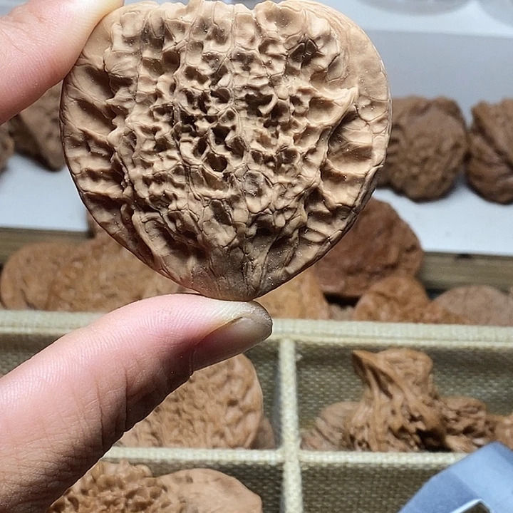 j***n桃核吊坠59官帽压扁