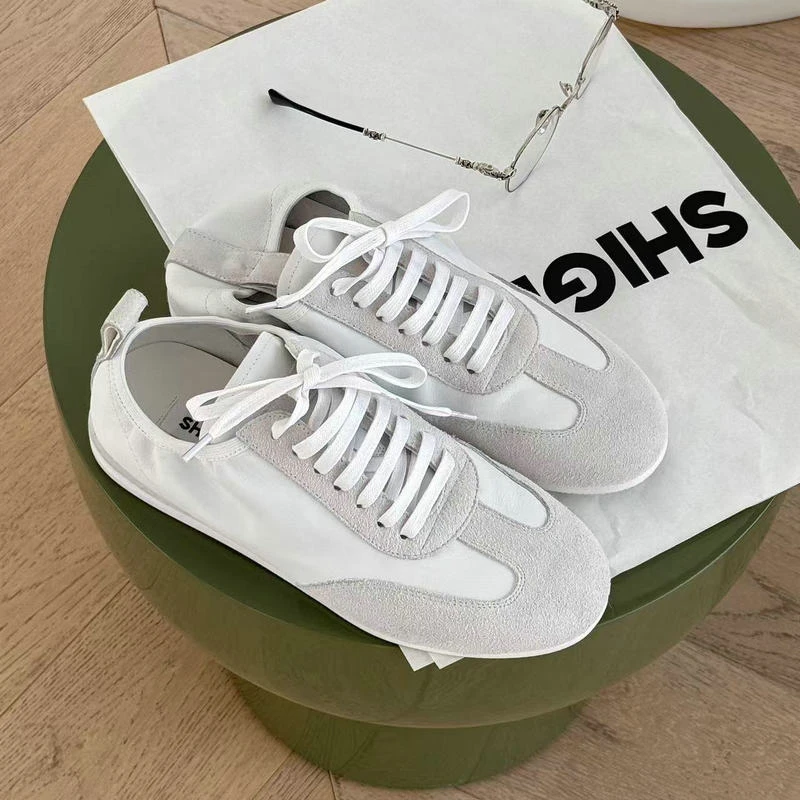 诗歌兰德训鞋女2025春季新款真皮休闲平底舒适休闲鞋1206-33