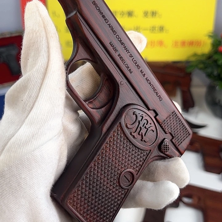 香榧木犀牛角紫檀花口撸子摆件