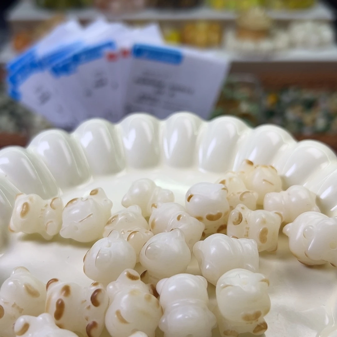 菩提根/象牙果手串瑕疵炭烧小熊10颗有裂