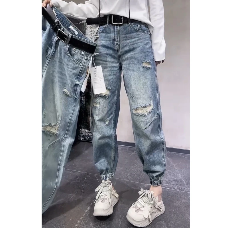 蓝色牛仔裤女士2025年春季新款爆款弯刀裤子破洞束脚裤宽松阔腿裤