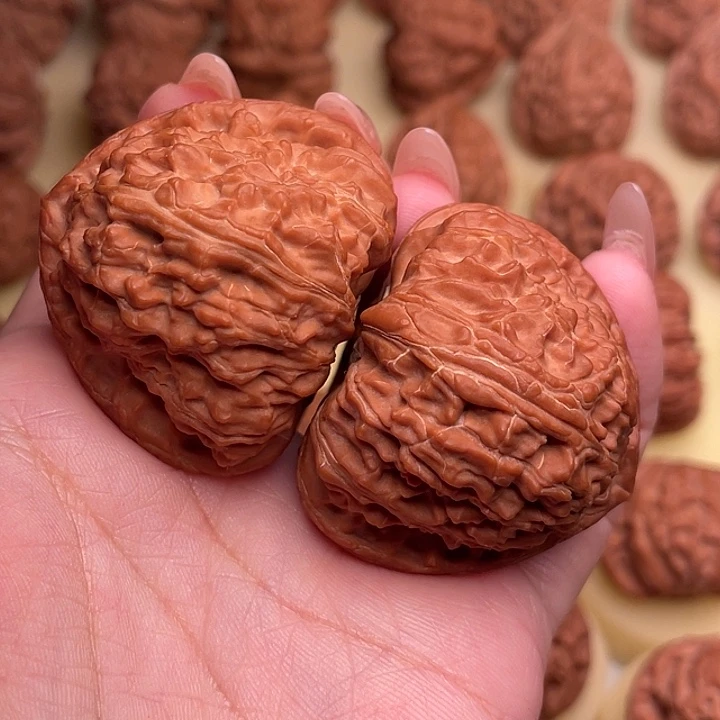 蒙***牙文玩核桃把件三角白45