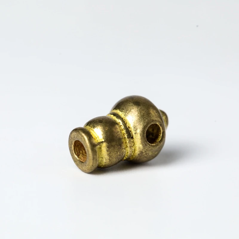 尼泊尔老铜三通对孔挂件 约10mm4g左右G33240701-04