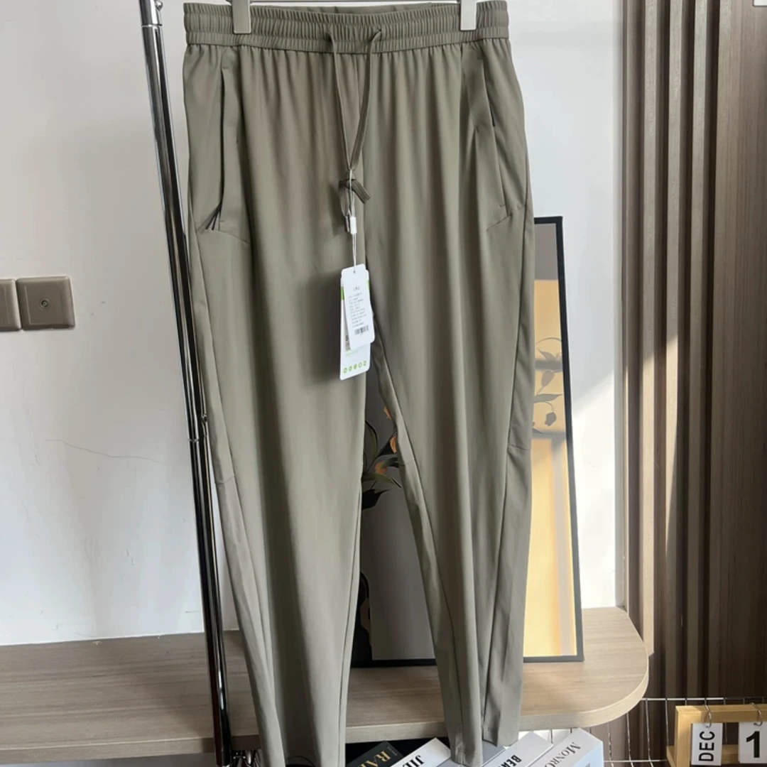 男士92002夏季百搭休闲雪花爆冰裤丹姐推荐