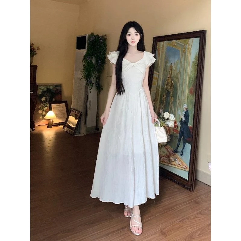 大码茶歇在逃公主A字长裙女2025夏季温柔风法式扭结小飞袖连衣裙