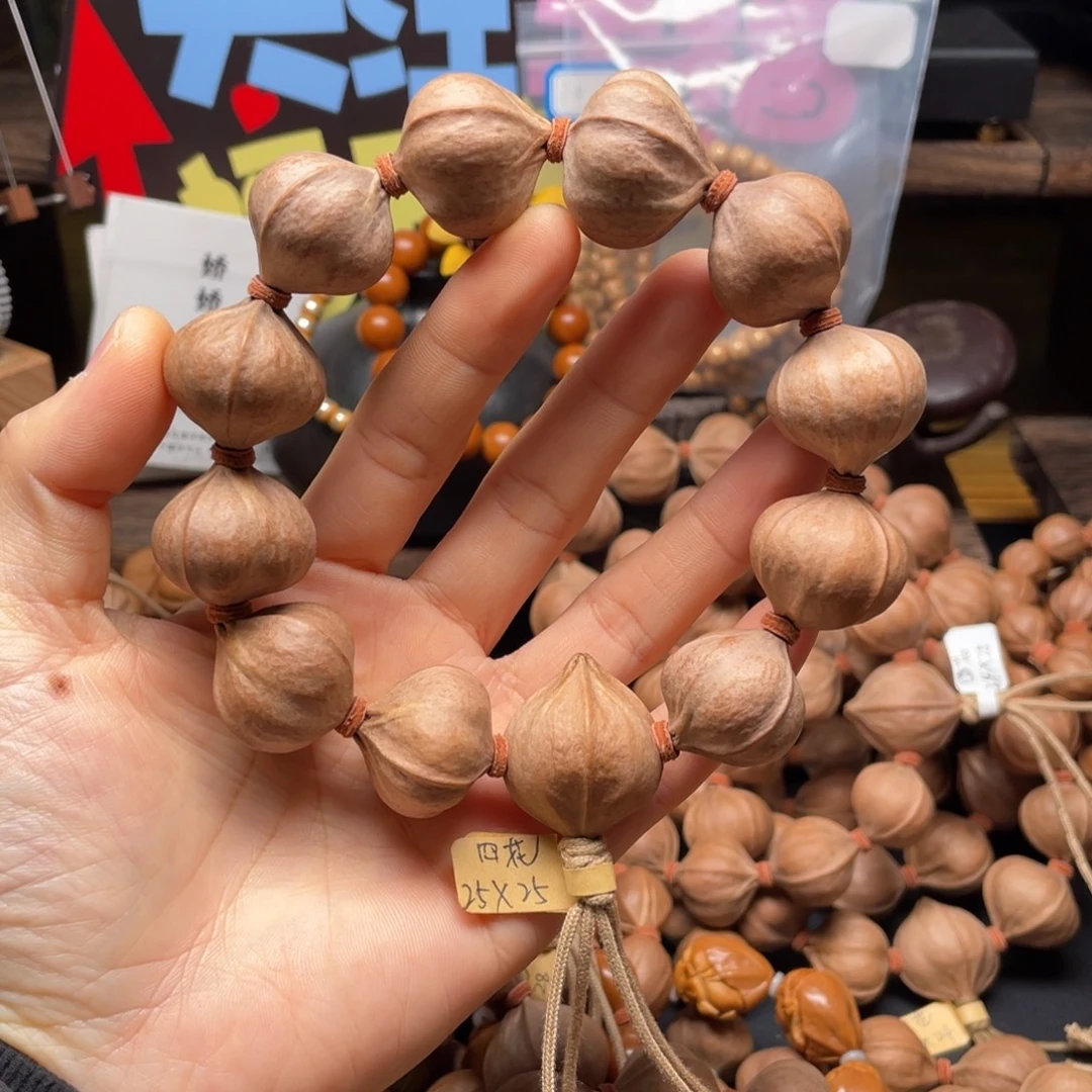 刀***日橄榄核吊坠2525四花铁核