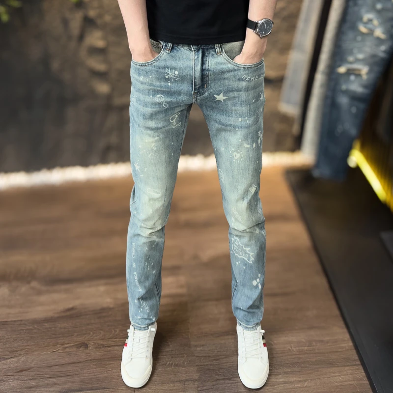 春夏季薄款男士欧货牛仔裤潮流时尚印花修身弹力小脚复古水洗长裤