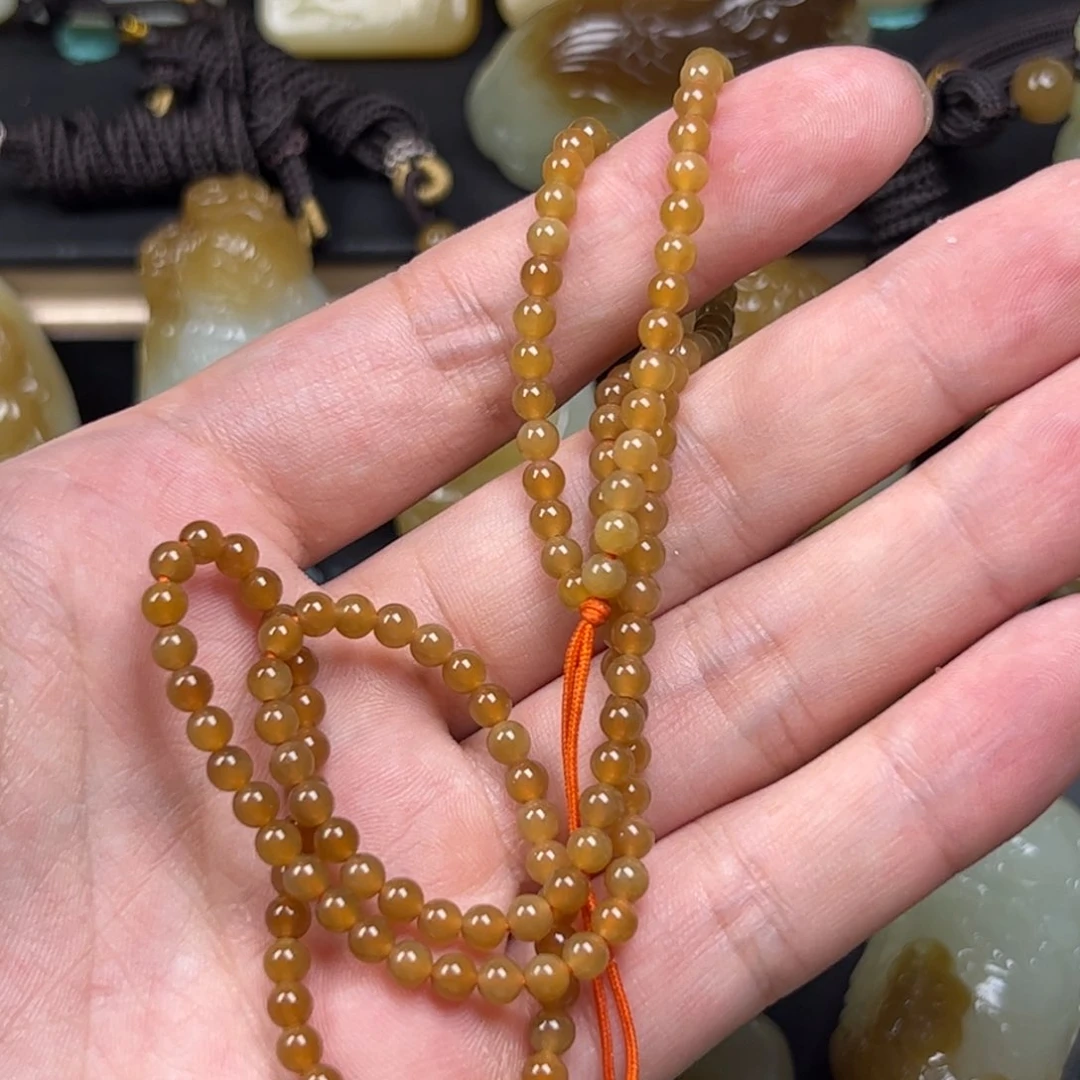 和田玉未镶嵌颈饰安**读