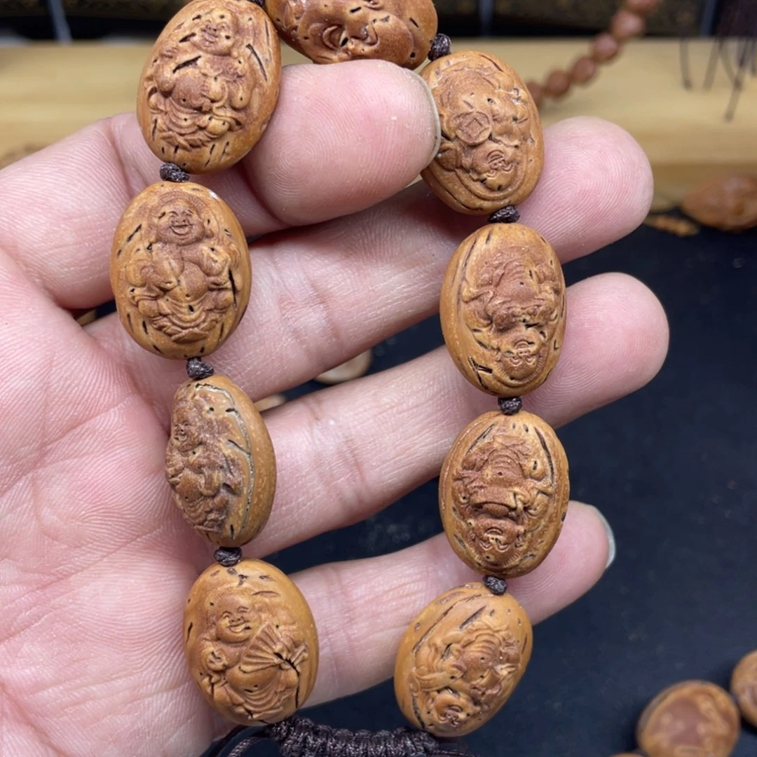 桃核雕刻弥勒手串
