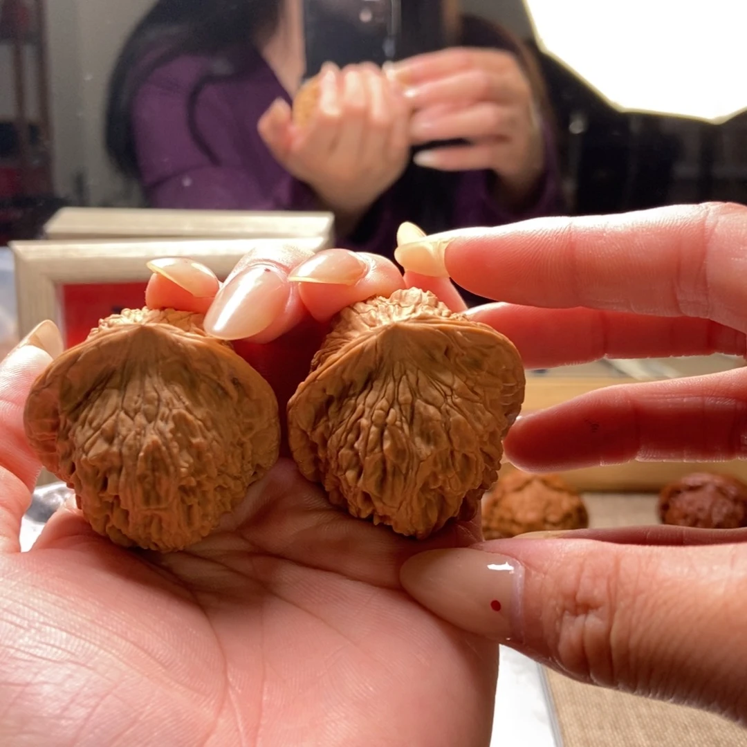 文玩核桃吊坠一***牛红狮子10