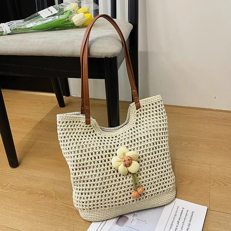 大容量镂空编织草编包女夏天2025新款单肩通勤托特海边度假沙滩包