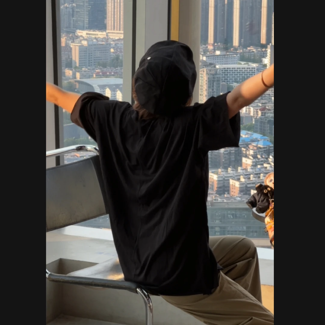 下半身失踪遮屁股微透卷边中长款慵懒大T