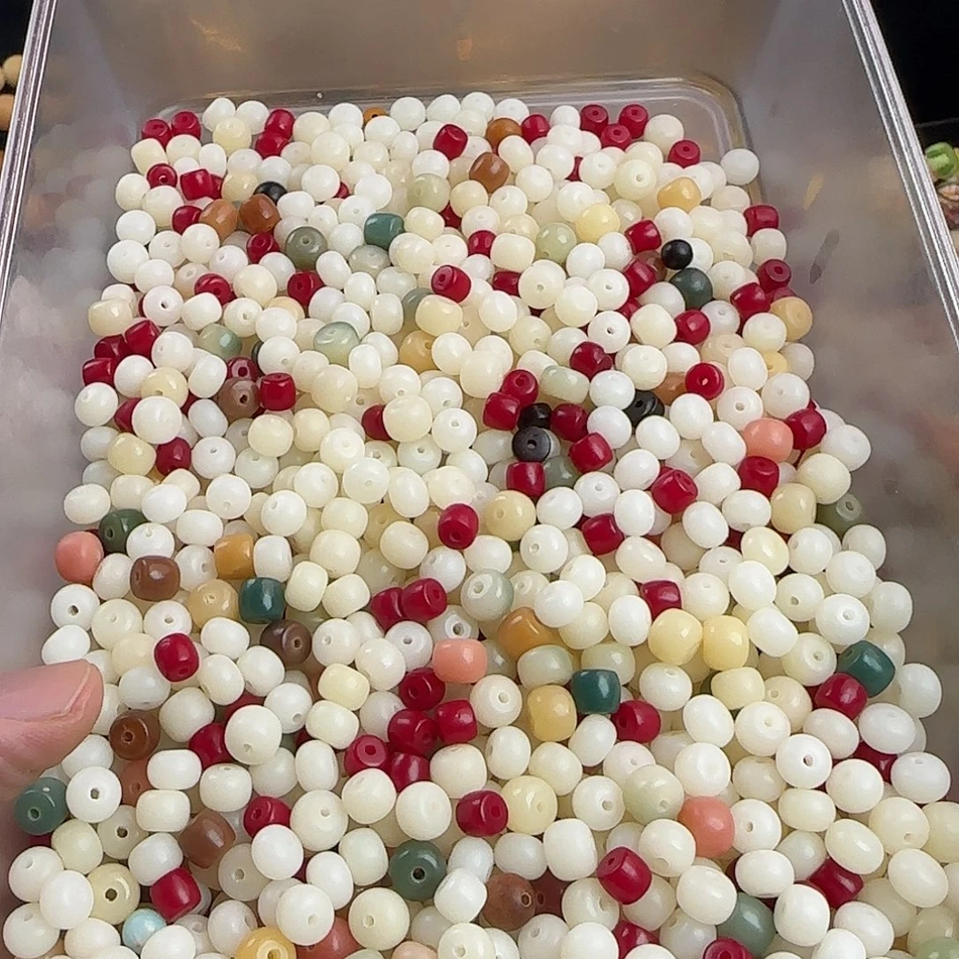 玉***琚菩提根/象牙果手串微瑕1100颗