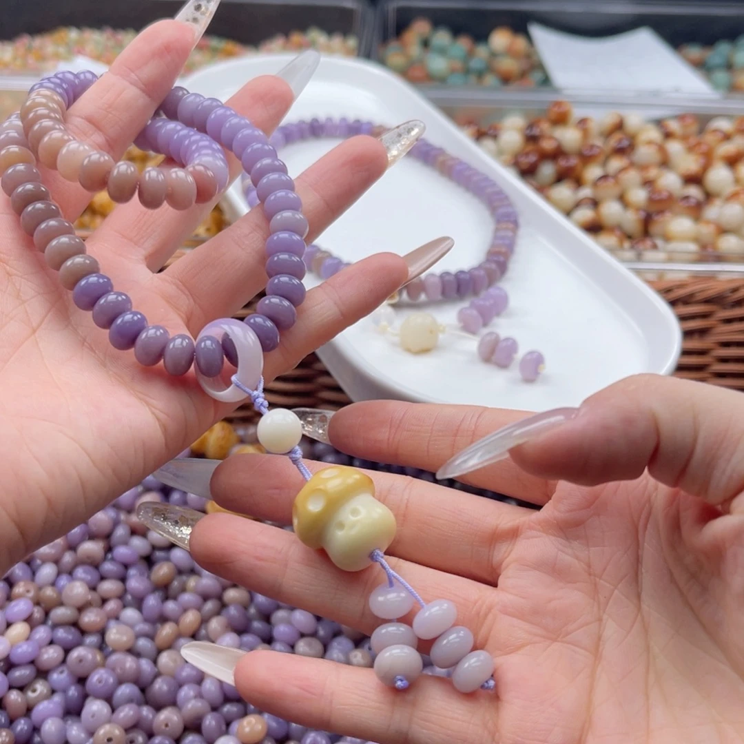 白玉菩提吊坠a9mm/100+10颗紫玉算盘+1颗瑕牙果