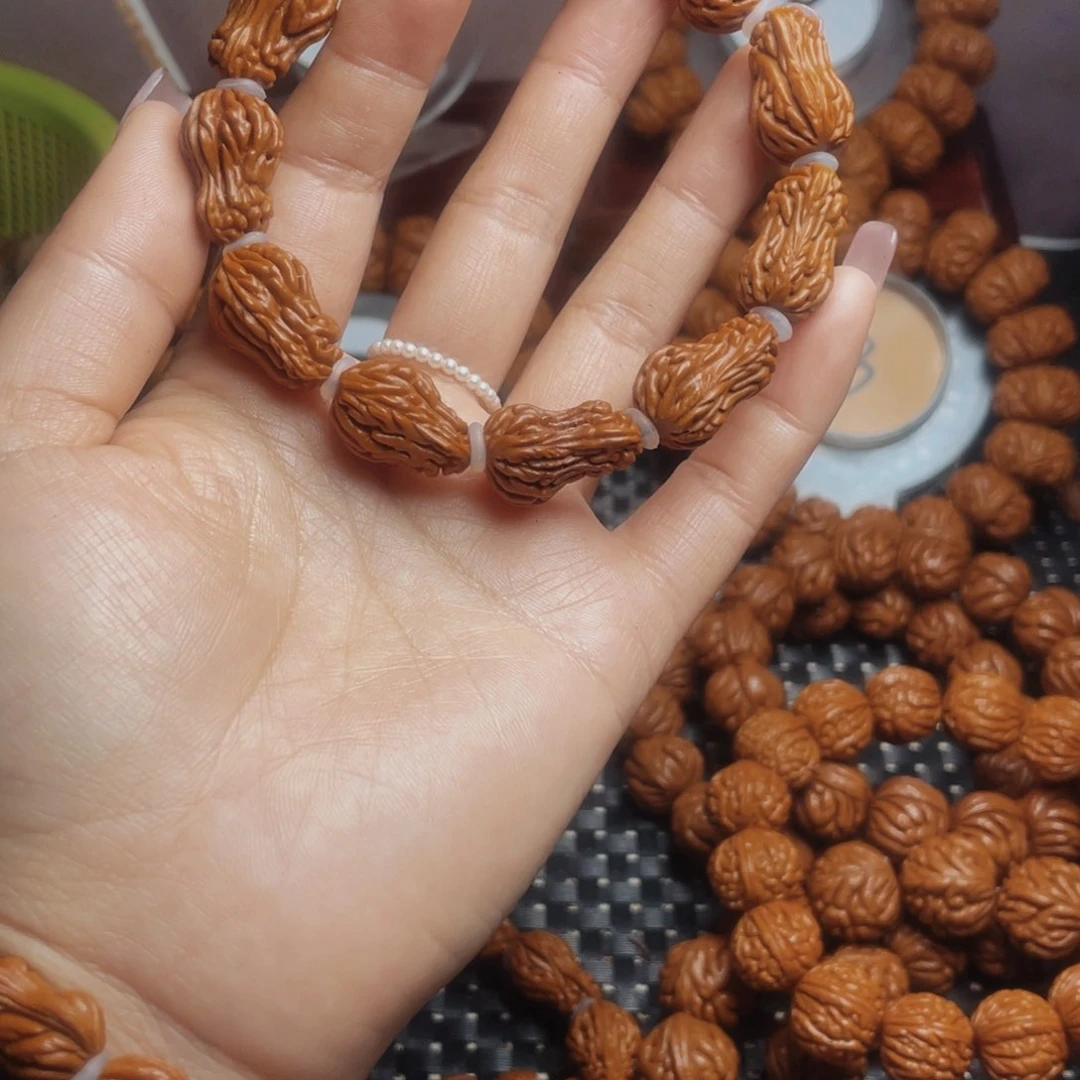 桃核手串时****秦岭龙纹桃核