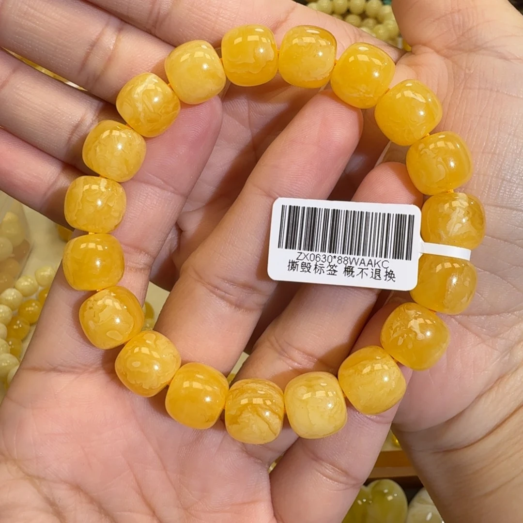 琥珀未镶嵌珠宝奇石11.8m焦皮同料橘黄花蜡手串18.9