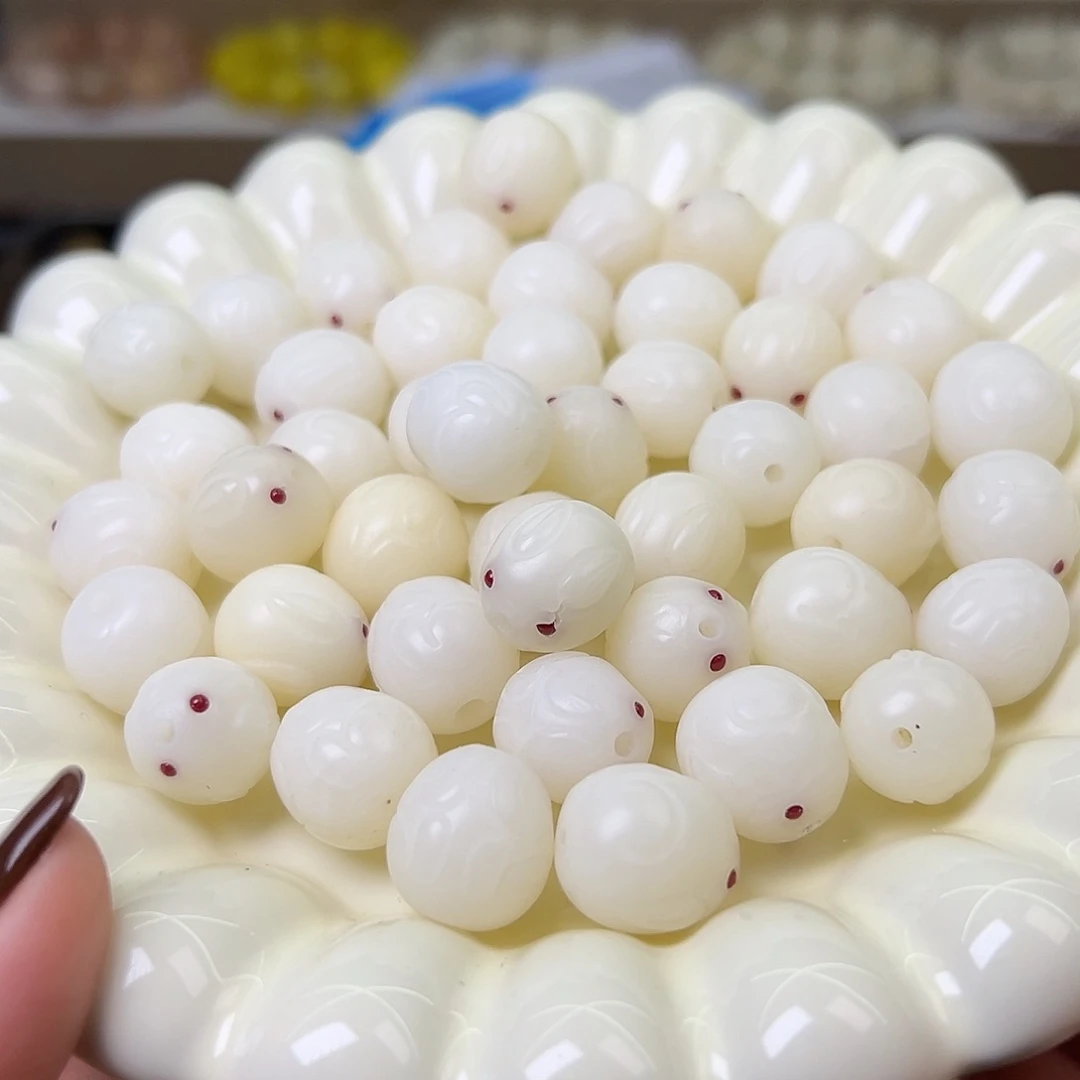 菩提根/象牙果手串瑕疵卡15面包兔20颗
