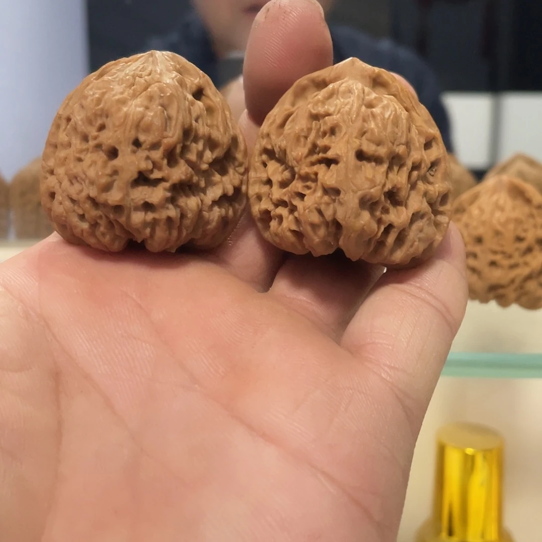 欣***云桃核吊坠文玩核桃南将石