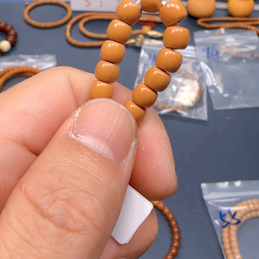 M***g手串橄榄核核尖极限弧尺寸6.3×10颗