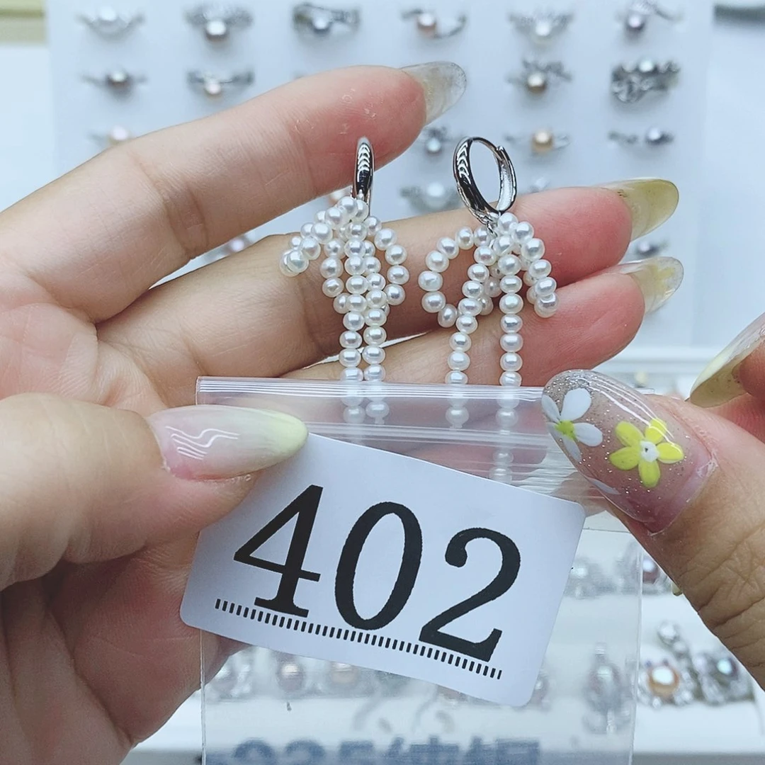 潜***伏戒指银S925镶嵌淡水珍珠402拍2发1