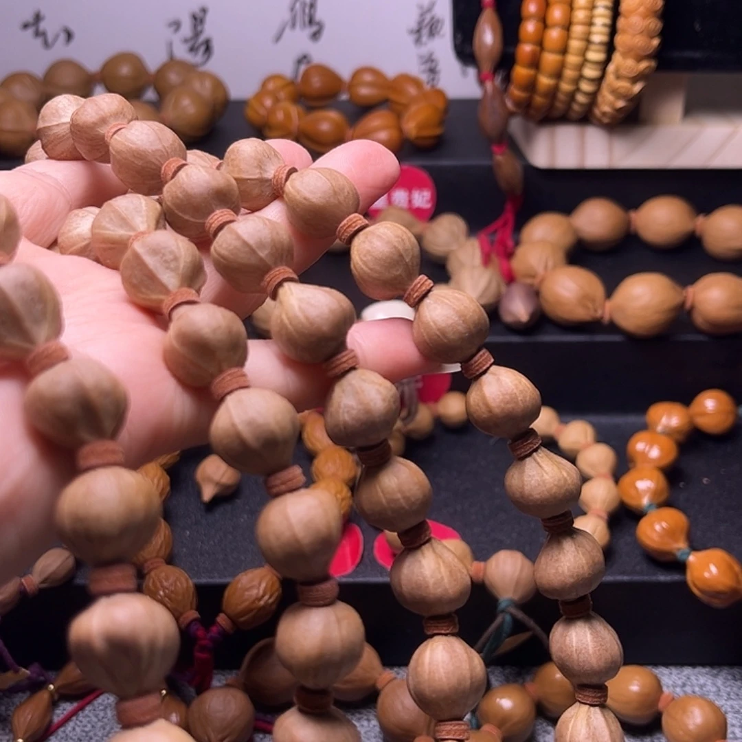 玖***壹吊坠橄榄核蜜桃臀播挂14.15