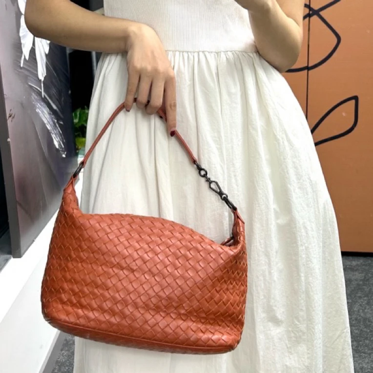 95新 BOTTEGA VENETA/葆蝶家 橘红色编织腋下包Ss