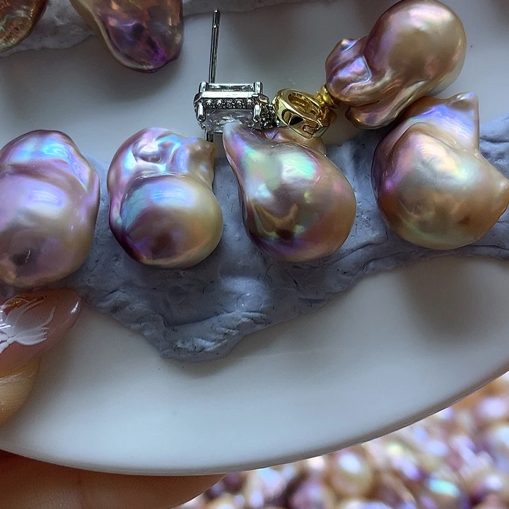 淡水珍珠耳饰银S925镶嵌菩***?