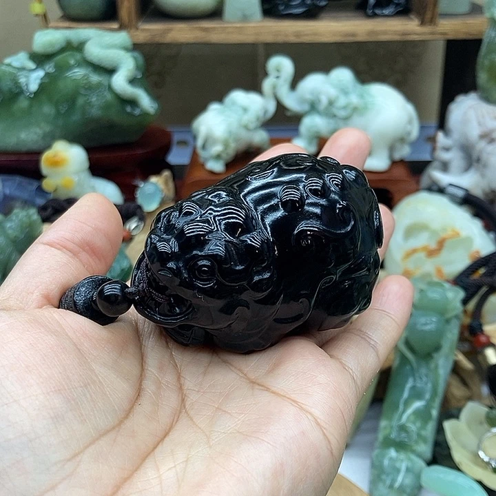 和田玉手把件未镶嵌龙*