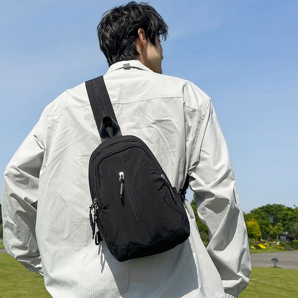 日系双肩包斜挎包2025新款潮牌运动挎包百搭轻便小背包手机胸包男