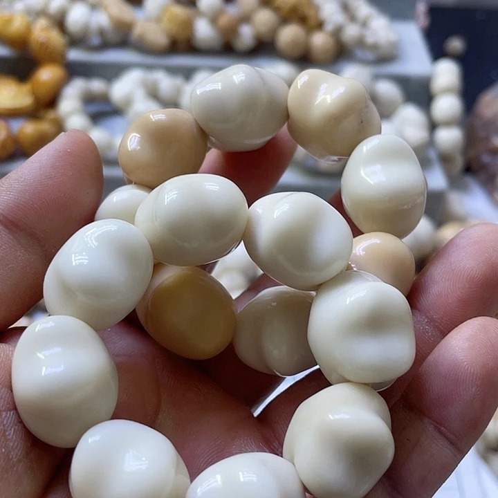 白玉菩提吊坠笨***?微瑕象牙果星星手捻二条