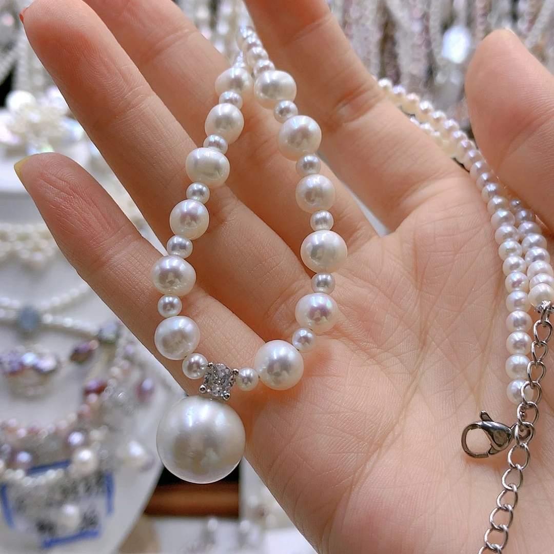 银S925镶嵌耳饰淡水珍珠碰*