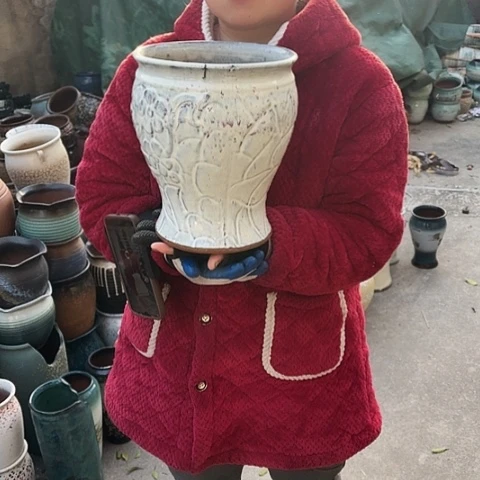 口20高25瑕疵口裂盆子。