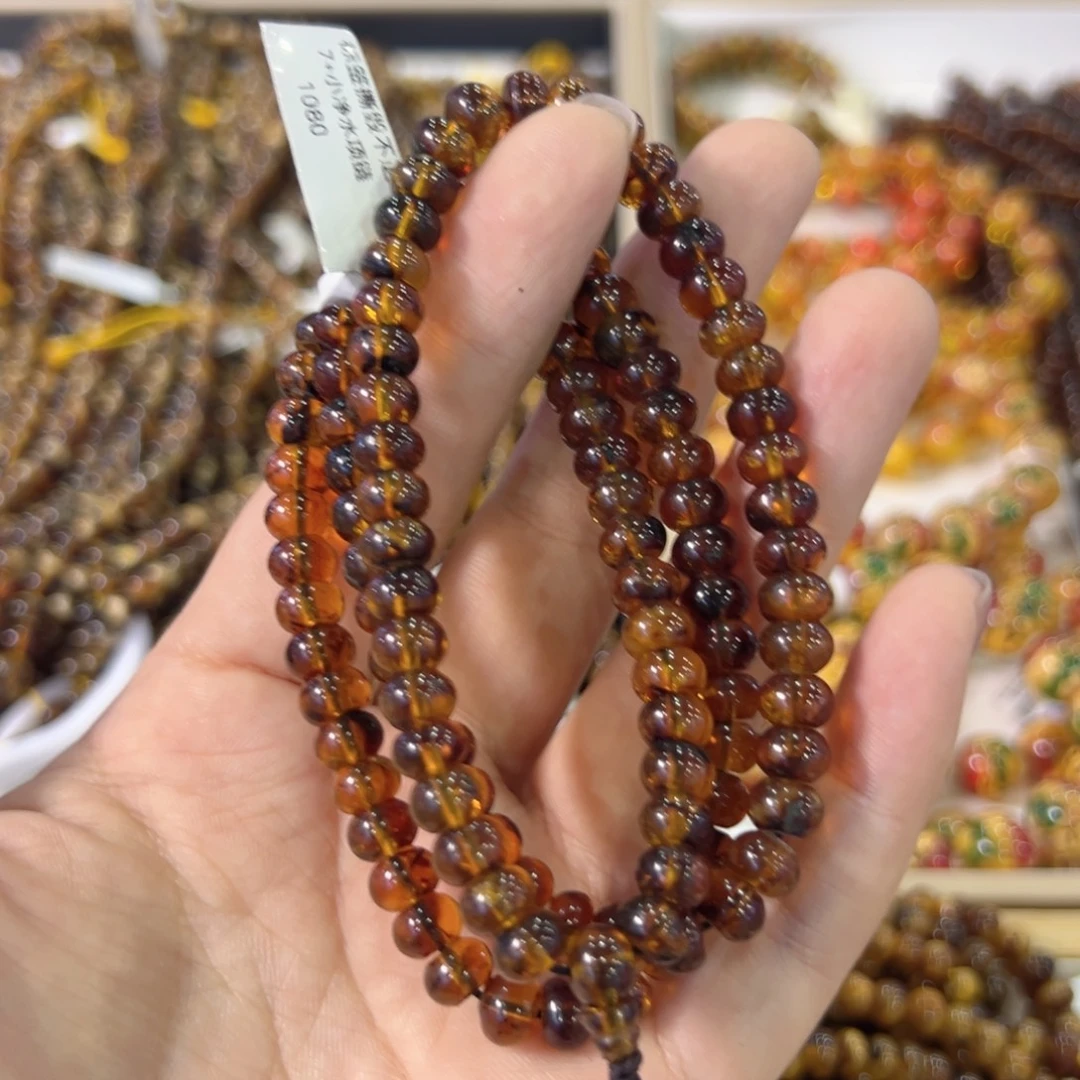 琥珀未镶嵌裸石抚顺琥珀7m108飘花蜡