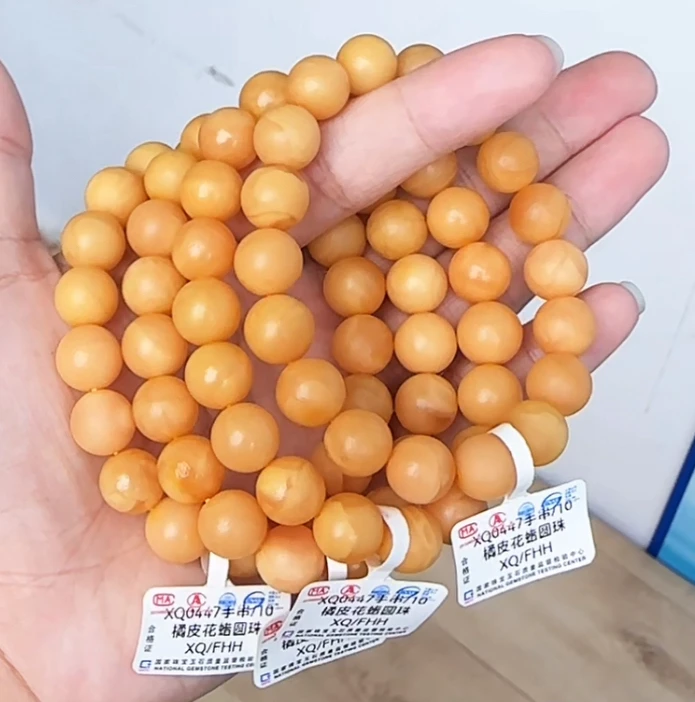 【齐福珠宝】XQ0447/10mm天然琥珀蜜蜡橘皮花蜡圆珠（多样性发其一）
