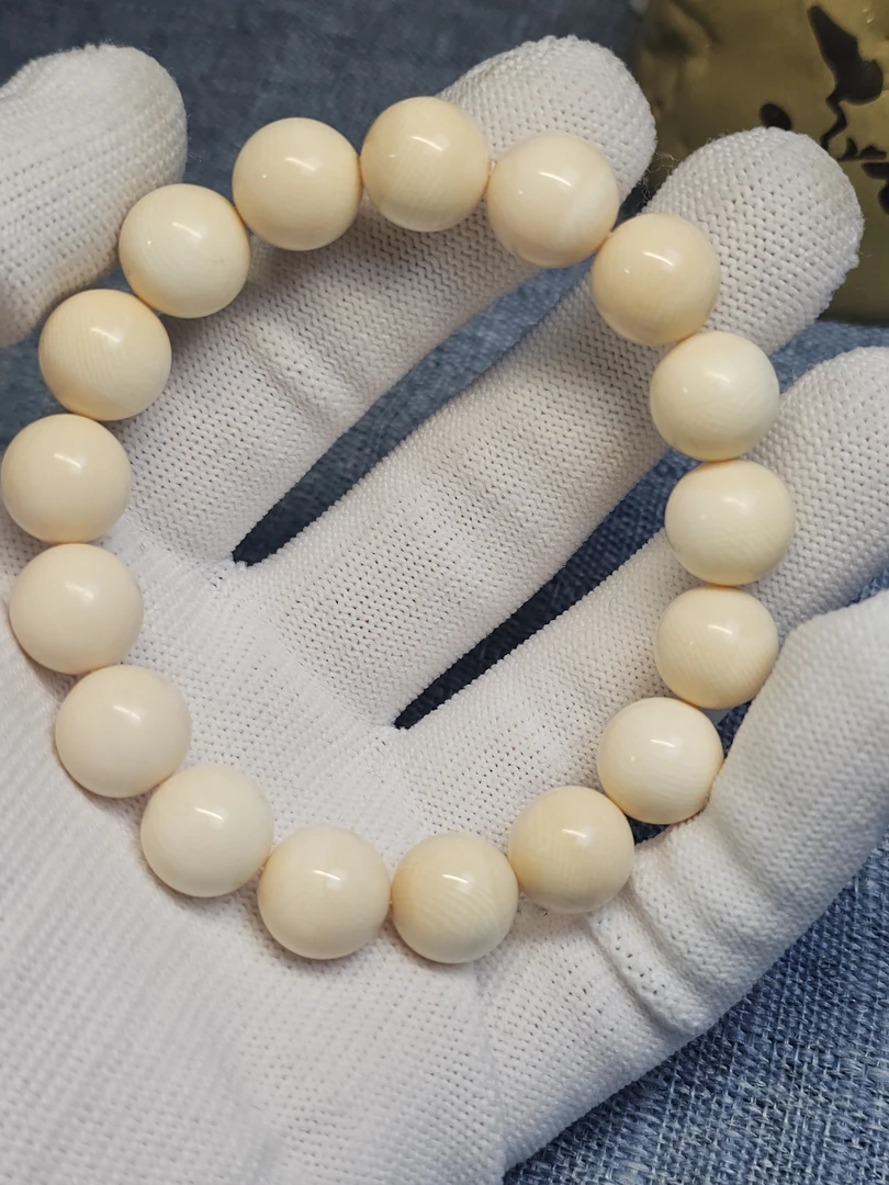天然猛犸牙1.2满纹果冻圆珠双色