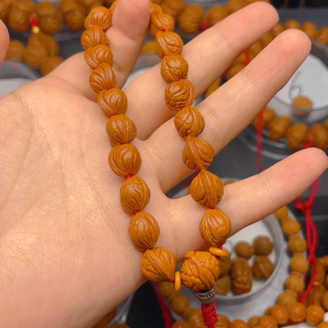 蔡***新桃核吊坠叶叶叶叶