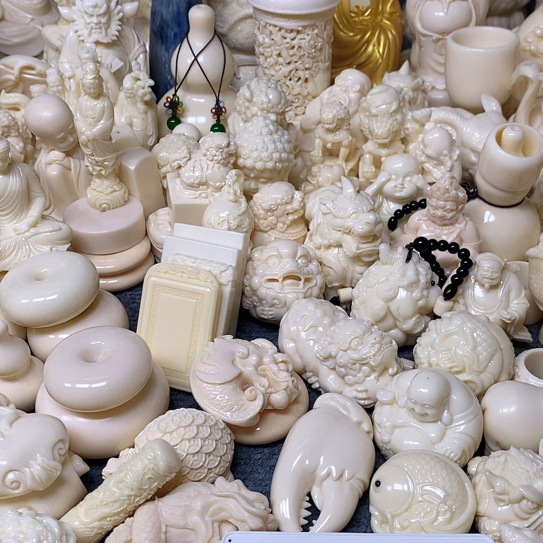 把件猛犸象牙招**猫螃蟹腿