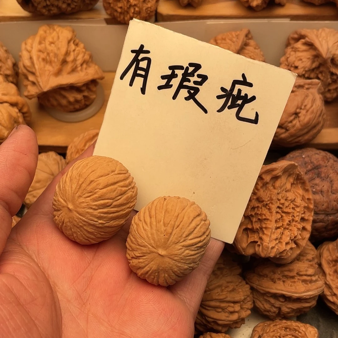斯***鸠文玩核桃吊坠猴头