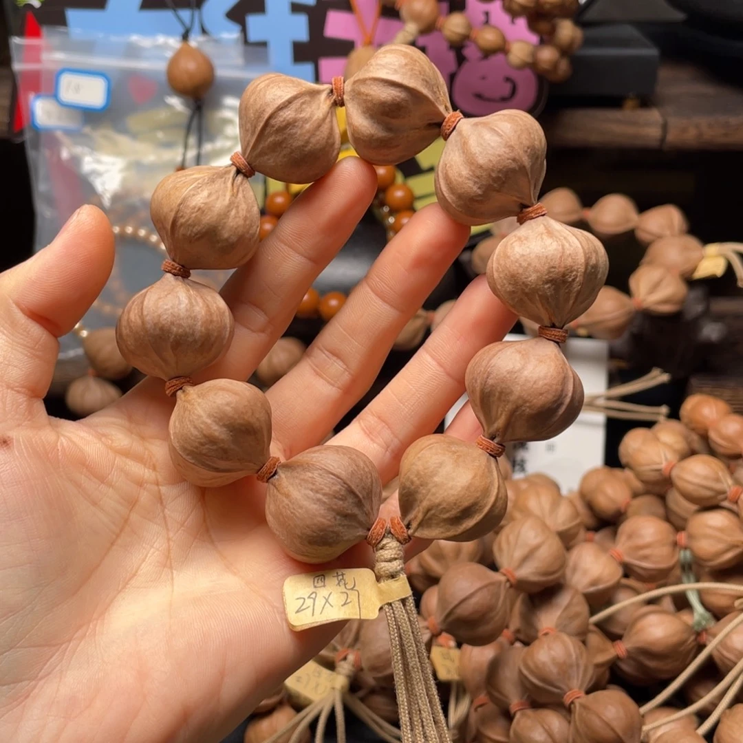 梅***爻吊坠橄榄核2927四花铁核