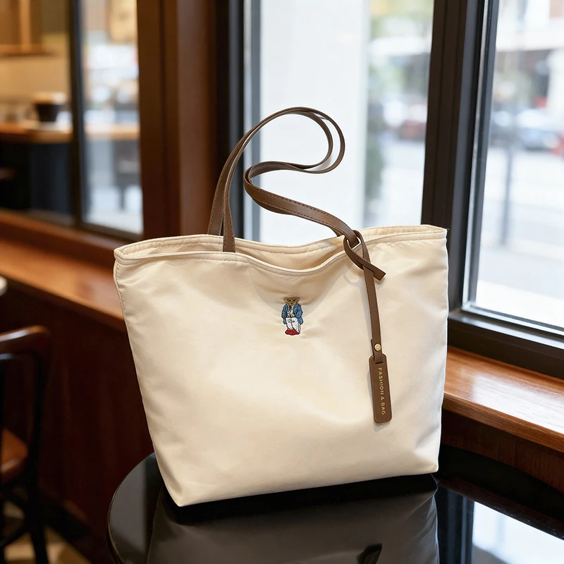 外出托特包包2025新款尼龙手提包单肩时尚大容量休闲通勤托特女包