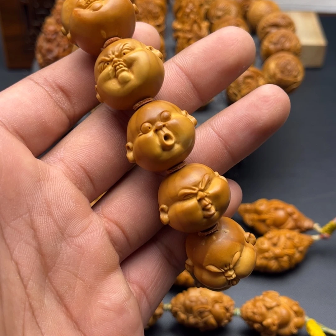 橄榄核手串人生百态