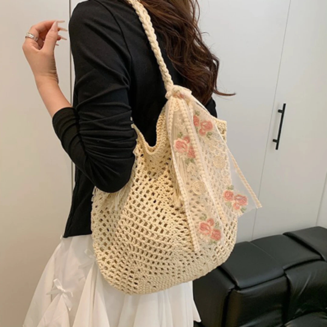 大容量编织包2025新款小众镂空单肩草编包休闲通勤托特包百搭女包