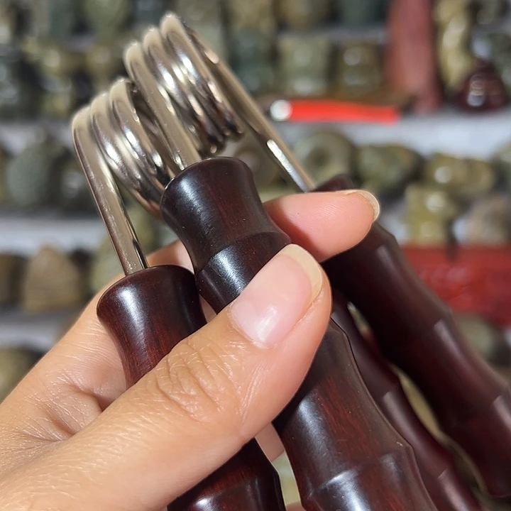 木乐****5非洲紫檀握力器