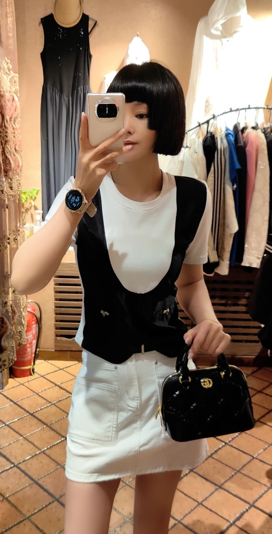 时尚女简约修身型毛衣条纹宽松不起球衫网红