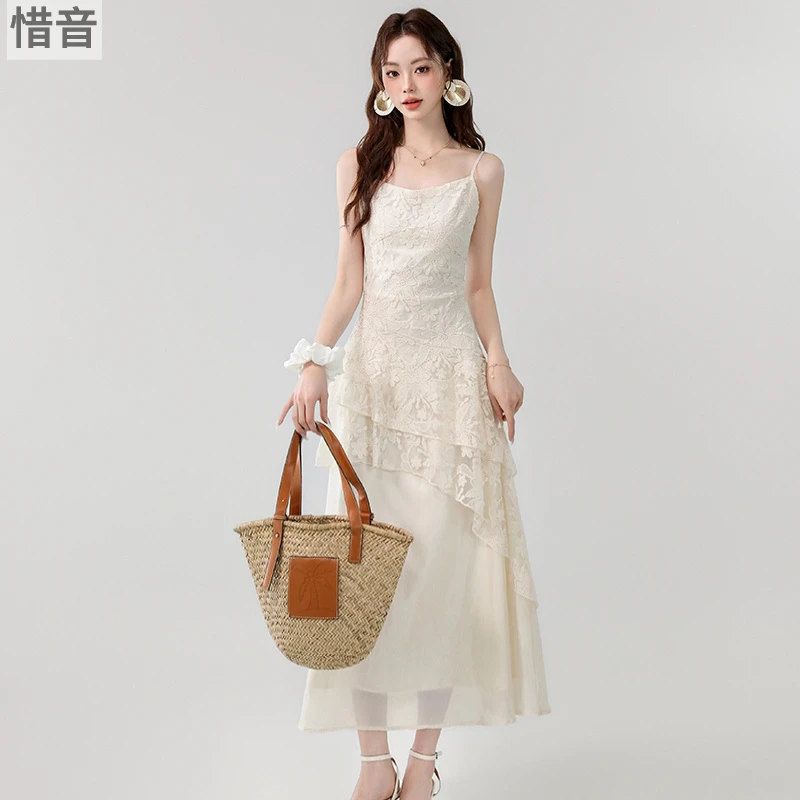 实拍2025夏季新款法式杏色温柔小众蕾丝刺绣不规则长款吊带连衣裙